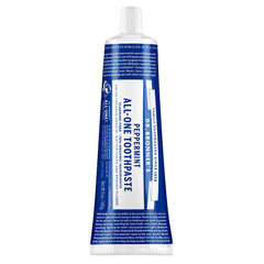 Dr. Bronner's tubo frontal mostrando etiqueta y beneficio limpieza natural