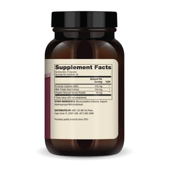 Mano sosteniendo cápsulas Dr. Mercola NAC para visualizar tamaño y facilidad de uso