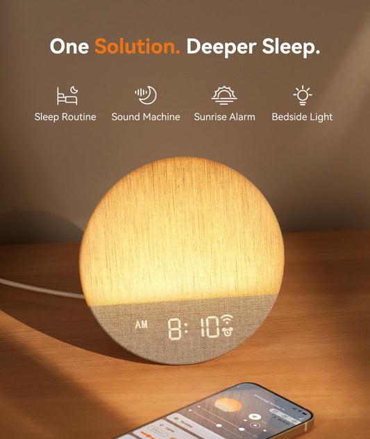 Dreamegg Sunrise 1+ night light casting a soft glow for late-night reading.