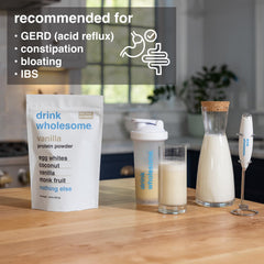 drink wholesome vaso con batido listo para beber, apoyo proteico digestivo