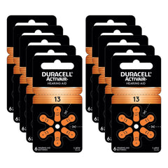 Duracell pila detalle de pestaña activadora y borde del blíster, facilidad de uso y protección