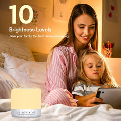 Easysleep junto a una cuna calmando bebé con sonidos suaves