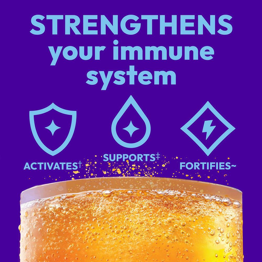 Emergen-C sobres disolviéndose en vaso, bebida rápida y práctica