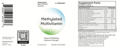 envitamin tabletas al lado de una moneda para comparar tamaño práctico