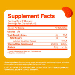 The Feel Great Vitamin Company gomitas sobre mesa con naranja, sabor atractivo