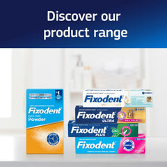 Fixodent comparado con una moneda para mostrar el tamaño portátil del tubo