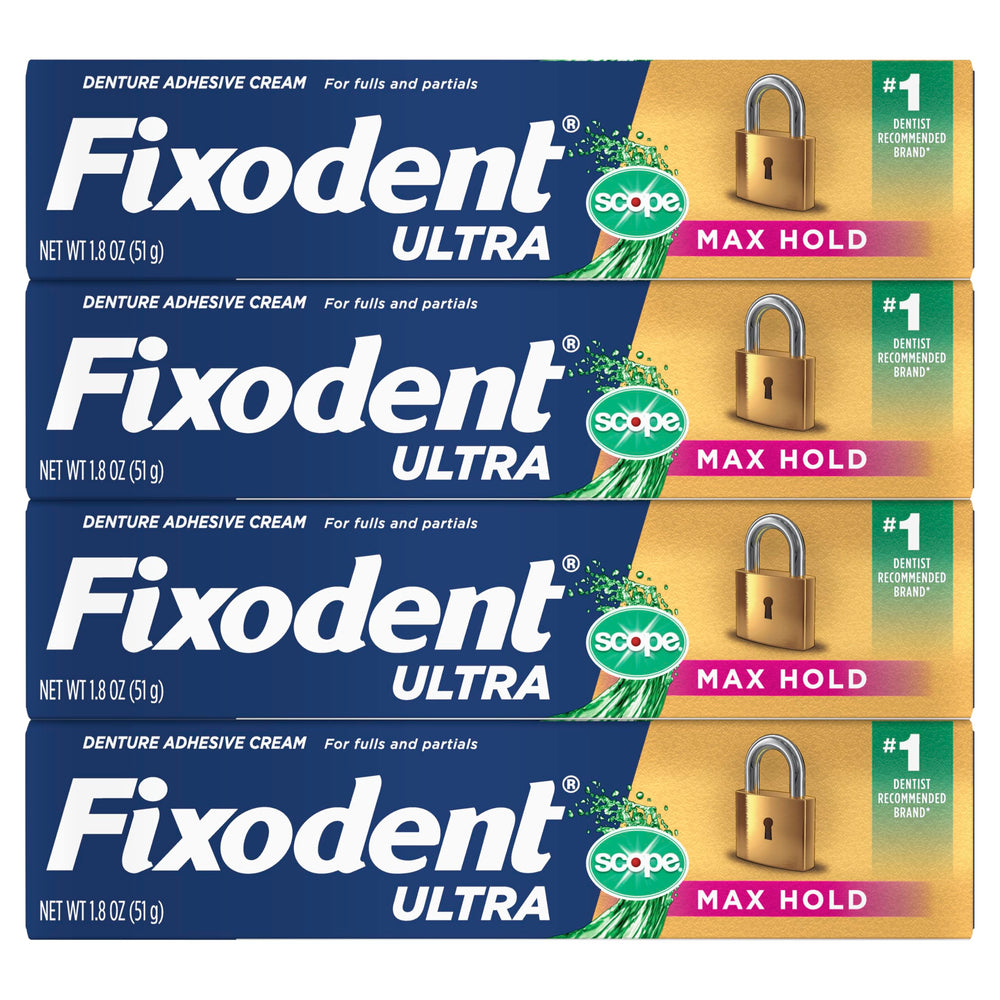 Fixodent en manos de usuario antes de colocar dentadura para ajuste perfecto