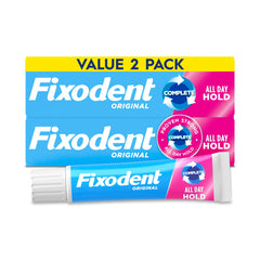 Fixodent envase pack de 2 tubos mostrando producto y conveniencia