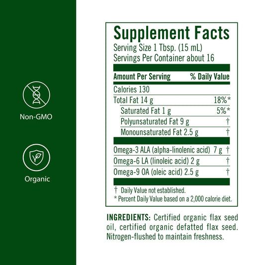 Flora High Lignan Flax Oil glass close-up highlighting amber bottle and freshness.