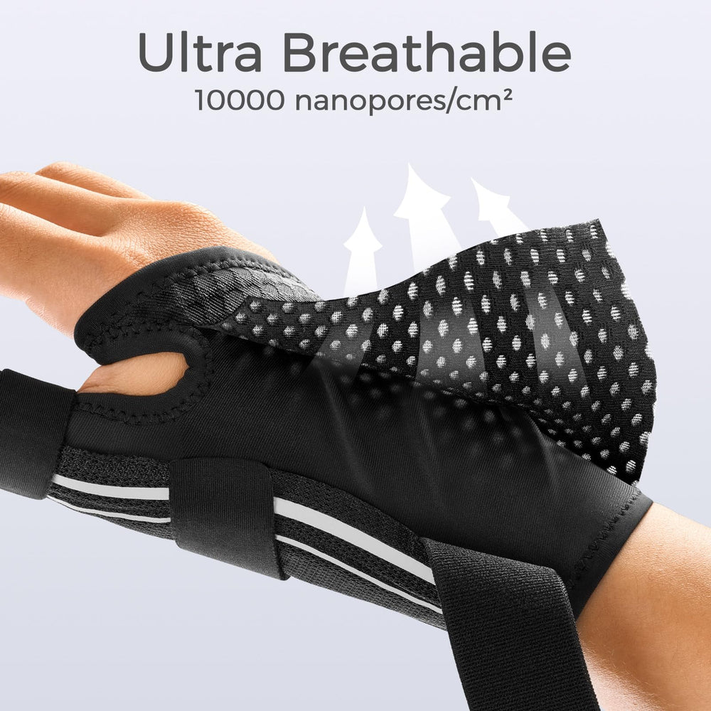 FREETOO persona usando la férula mientras teclea, mantiene función y reduce dolor