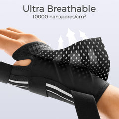 FREETOO persona usando la férula mientras teclea, mantiene función y reduce dolor