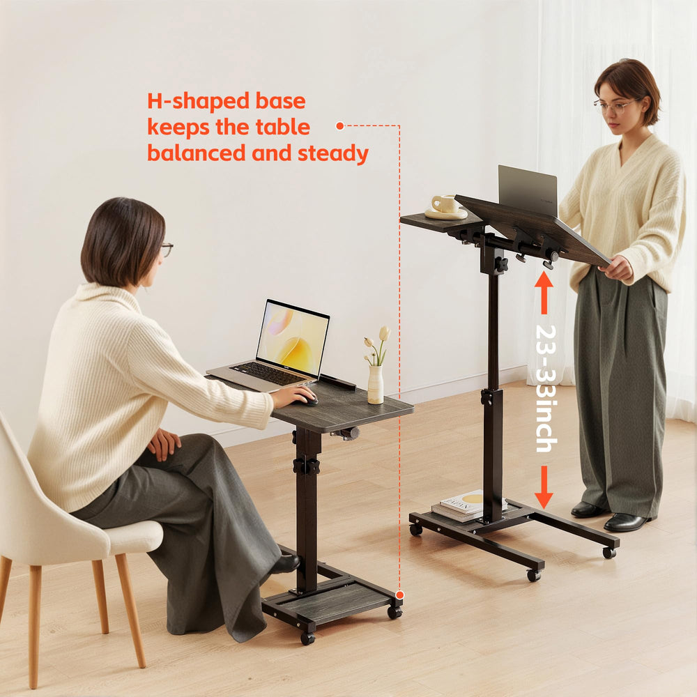 Furist mesa con portátil en uso, favorece ergonomía para trabajar sentado o de pie