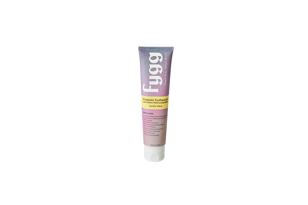 Fygg pasta dental frente del tubo mostrando etiqueta y sabor vainilla, ideal para niños
