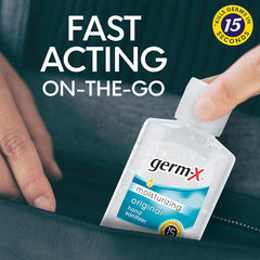 Germ-X envase en mano demostrando uso rápido y portátil