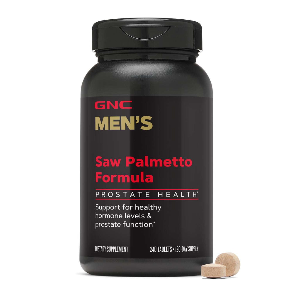 GNC Mega Men Saw Palmetto comparación de tamaño de la tableta con una moneda