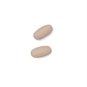 GNC Milestones en mano mostrando tamaño y conveniencia para adolescentes