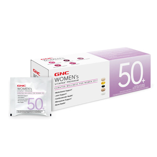 GNC pack frontal mostrando caja del Vitapak y sobres, facilita rutina diaria