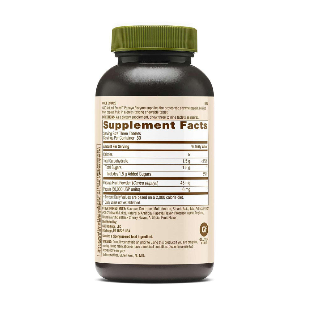 Primer plano de una tableta masticable GNC Papaya Enzyme mostrando textura, fácil de masticar