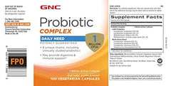 GNC cápsula abierta detalle de polvo probiótico y pureza