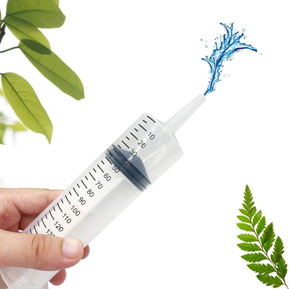 GNEGKLEAN jeringa usada en maceta para riego preciso