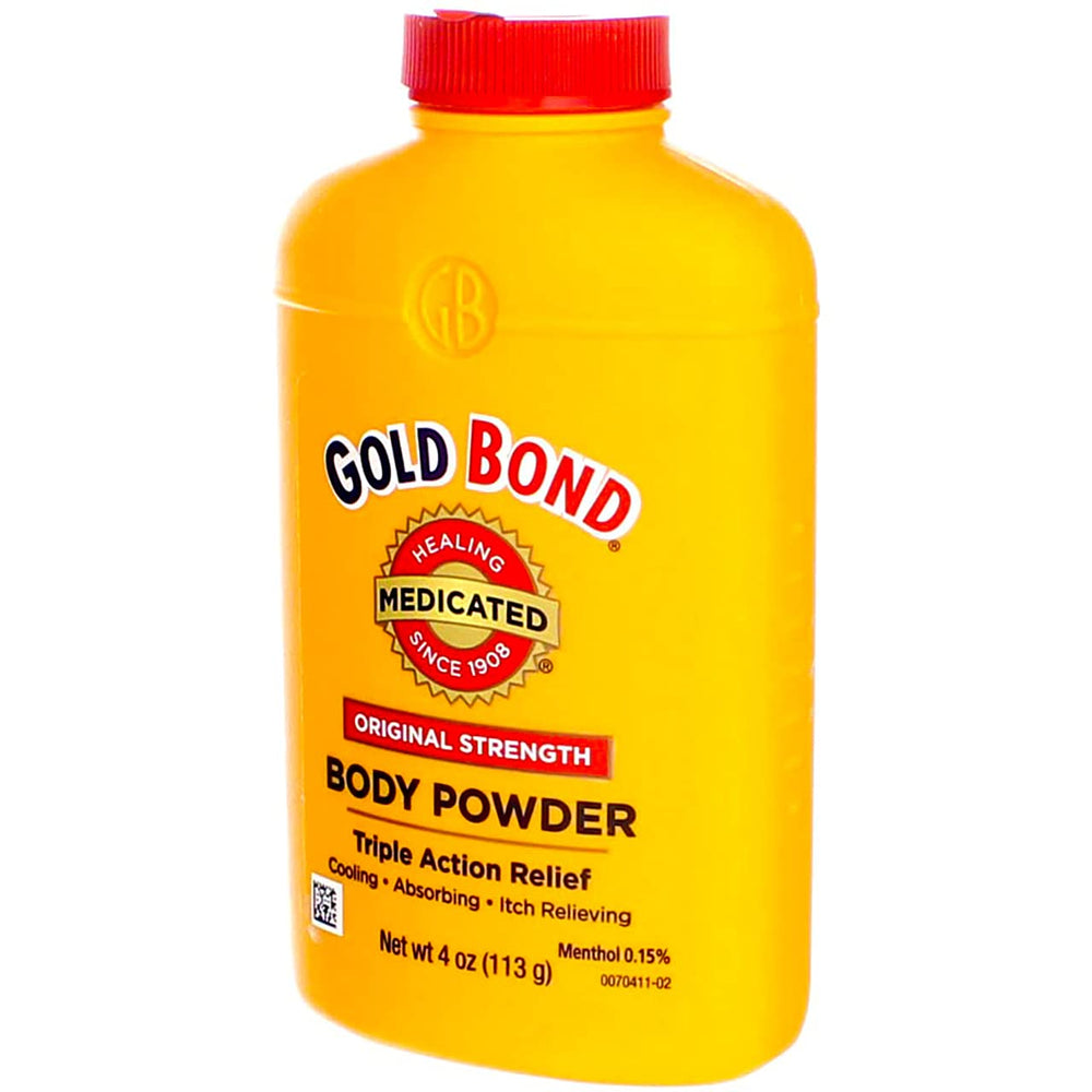 Gold Bond envase en baño junto a toallas mostrando uso diario conveniente