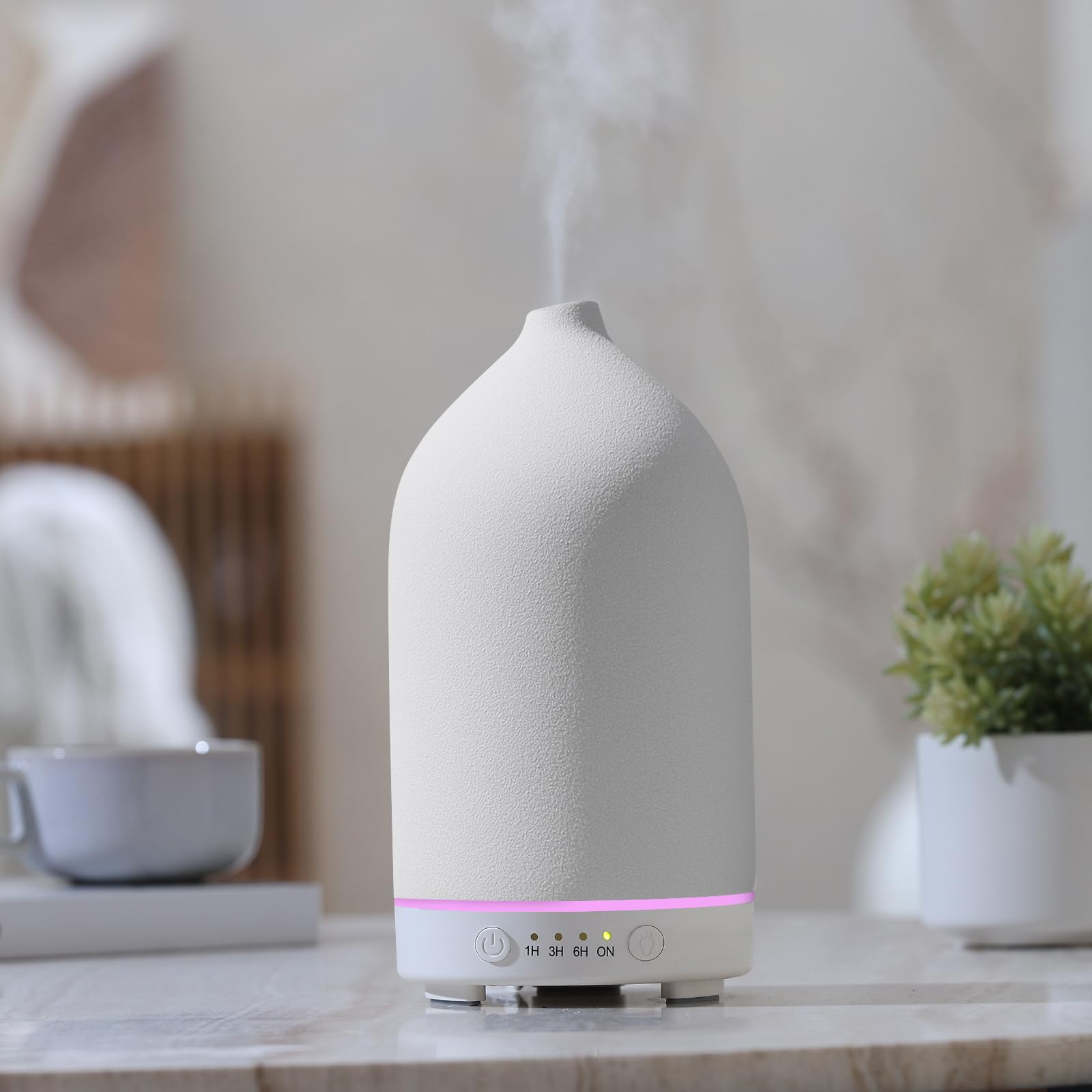 Gooamp difusor cerámica frontal mostrando su diseño elegante y aporte decorativo