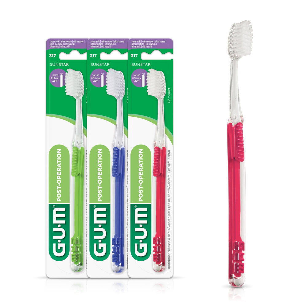 GUM cepillo postquirúrgico vista frontal mostrando cabeza compacta y mango plano para control