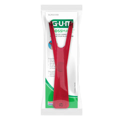 GUM Flossmate comparación de tamaño con un cepillo para entender escala
