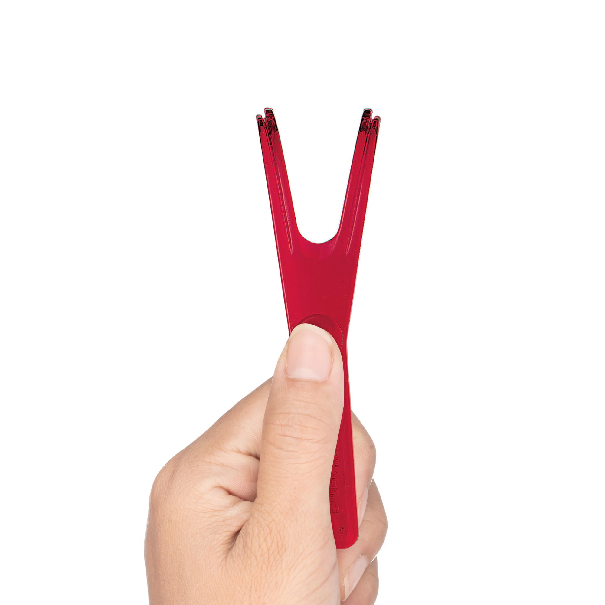 GUM Flossmate en uso entre dientes demostrando acceso a molares posteriores