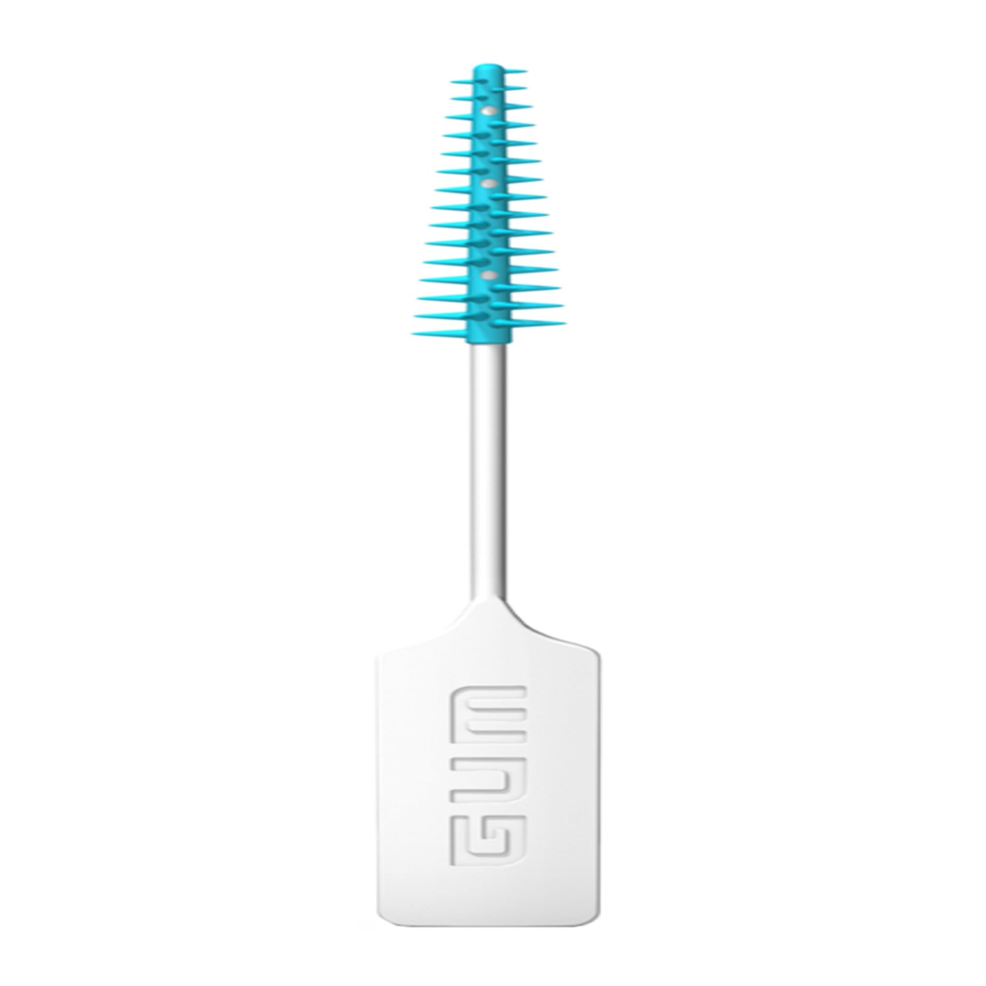GUM pick usado entre dientes retirando restos para mejor limpieza