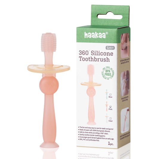 haakaa cepillo frontal rosa mostrando forma ergonómica y limpieza segura
