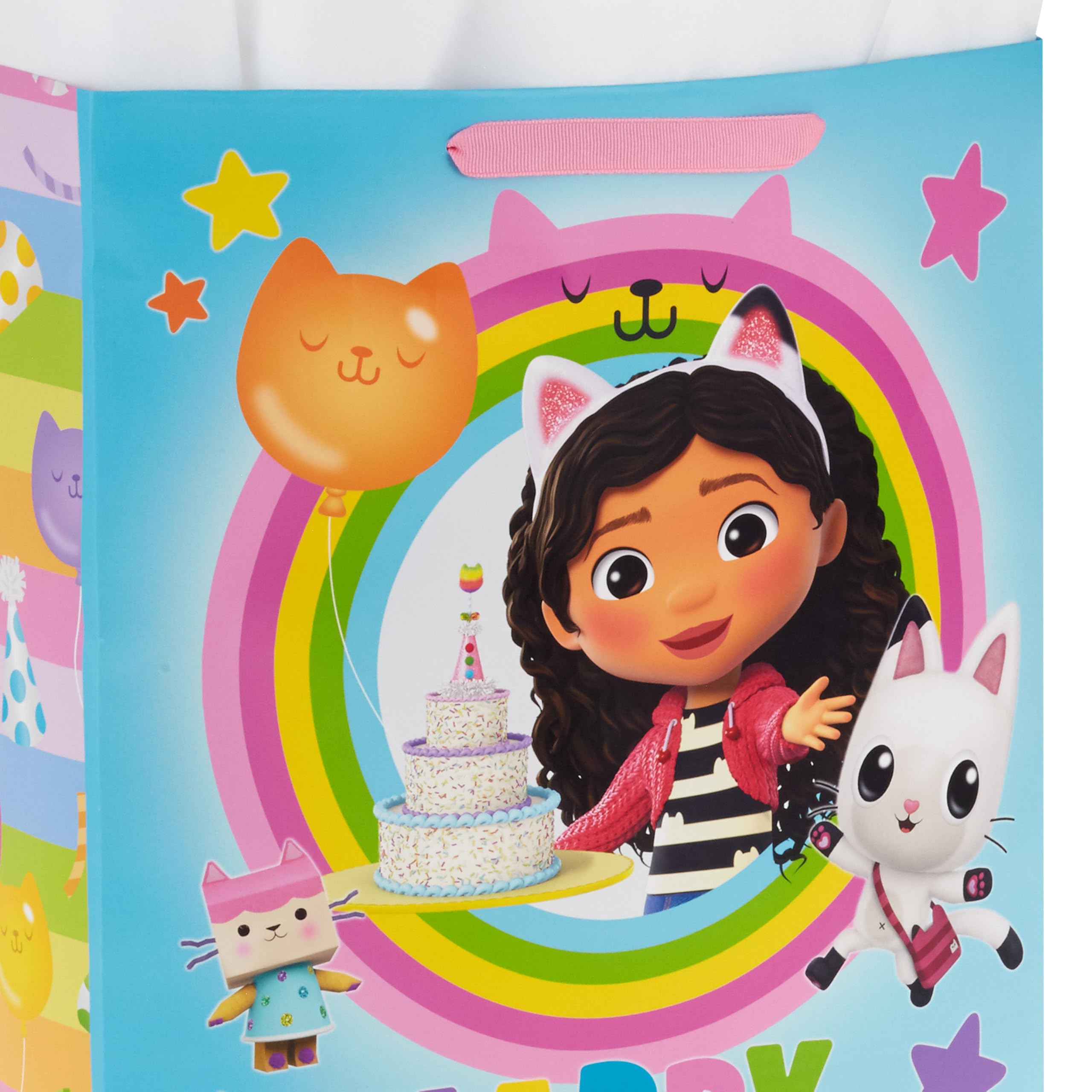 Hallmark bolsa con regalo dentro mostrando escala y capacidad para juguetes grandes