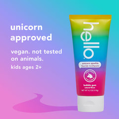 hello unicorn tubo junto a una moneda para comparar tamaño y cantidad práctica
