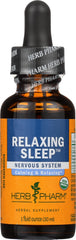 Herb Pharm botella junto a una moneda para escala, tamaño práctico de 1 oz