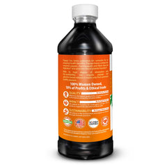 Herbal Goodness botella ámbar al lado de una regla para comparar tamaño