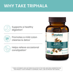 Himalaya Triphala junto a moneda para comparar tamaño y facilitar dosificación