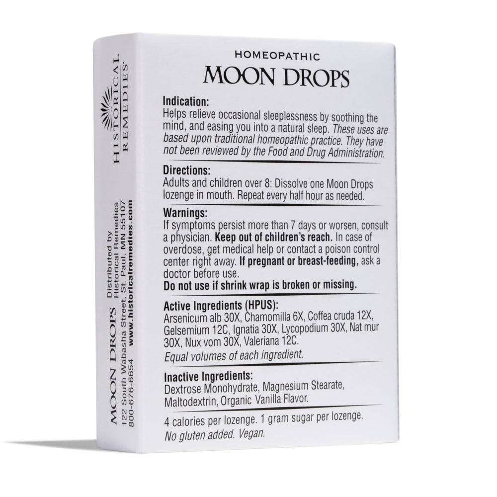 Historical Remedies Moon Drops frasco sobre mesita de noche en ambiente relajante