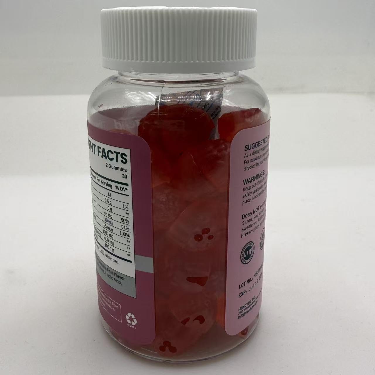 HOLLEGEND etiqueta nutricional destacando L-lisina y monolaurina por porción