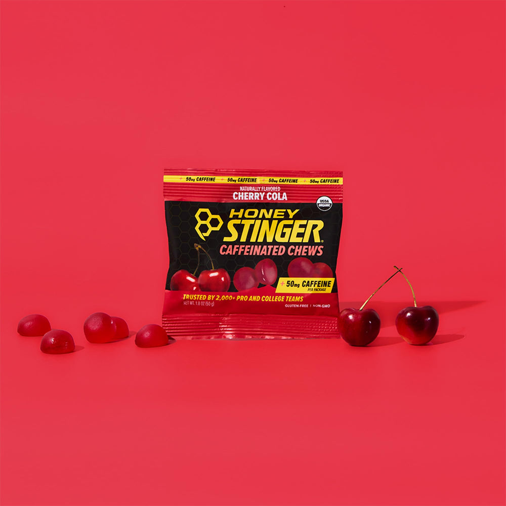 Honey Stinger comparación de tamaño con una moneda para escala portable
