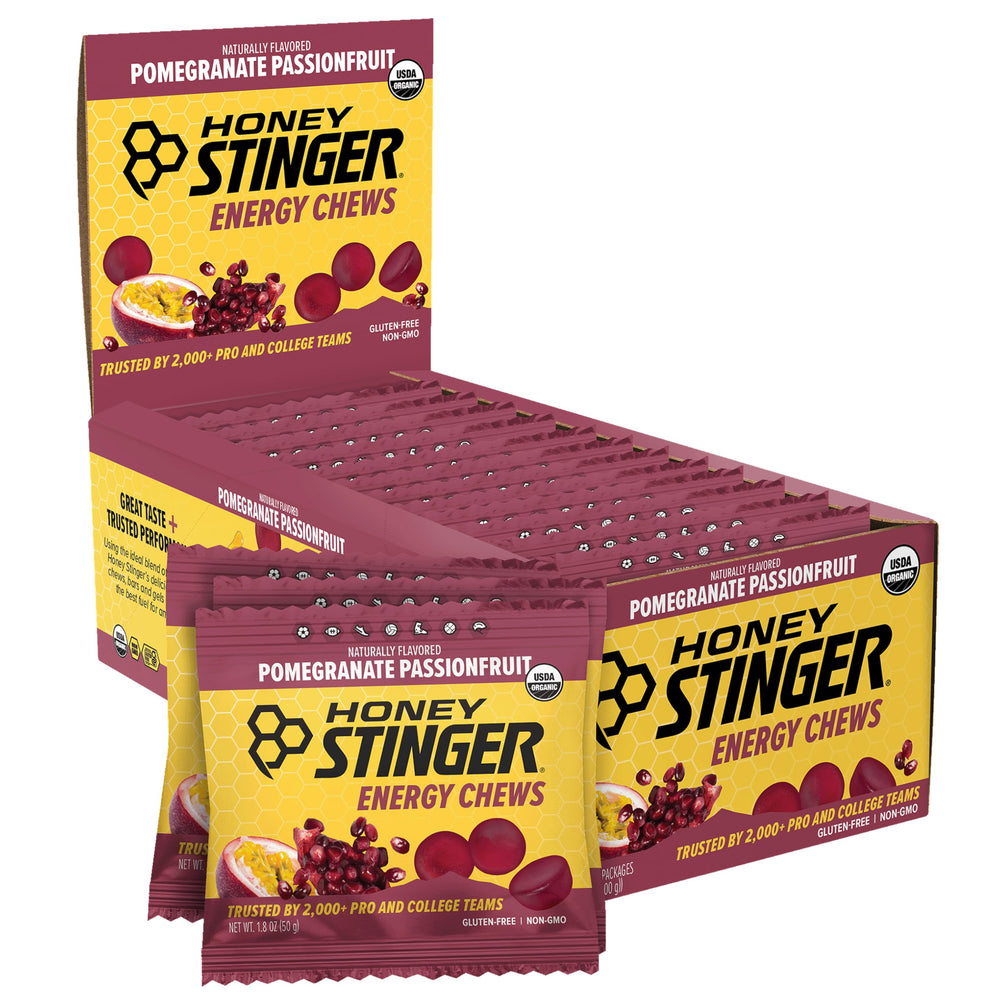 Honey Stinger frontal de la caja pomegranate passionfruit mostrando diseño y cantidad