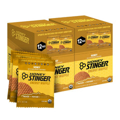 Honey Stinger frontal del paquete mostrando caja de 24 unidades y conveniencia