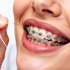 Houselog uso con brackets demostrando limpieza bajo alambres y arcos
