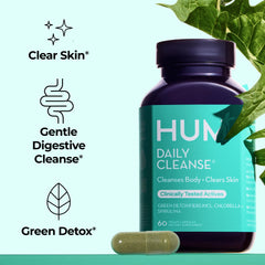 HUM Daily Cleanse cápsulas en primer plano, textura y tamaño visible