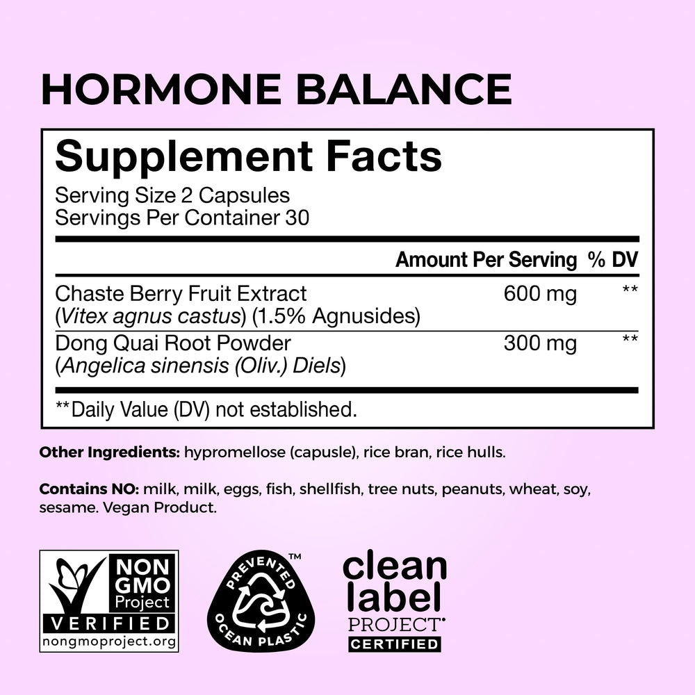 HUM Hormone Balance cápsulas en mano mostrando tamaño y facilidad