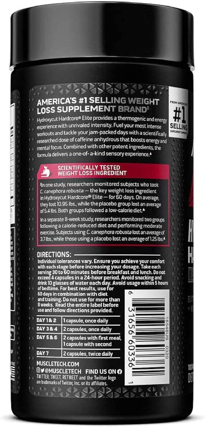Cápsulas Hydroxycut sobre mesa de gimnasio, sugiere apoyo energético antes del entrenamiento