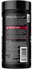Cápsulas Hydroxycut sobre mesa de gimnasio, sugiere apoyo energético antes del entrenamiento