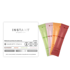 Instant Hydration frente del paquete mostrando variedad de sabores y cero azúcar