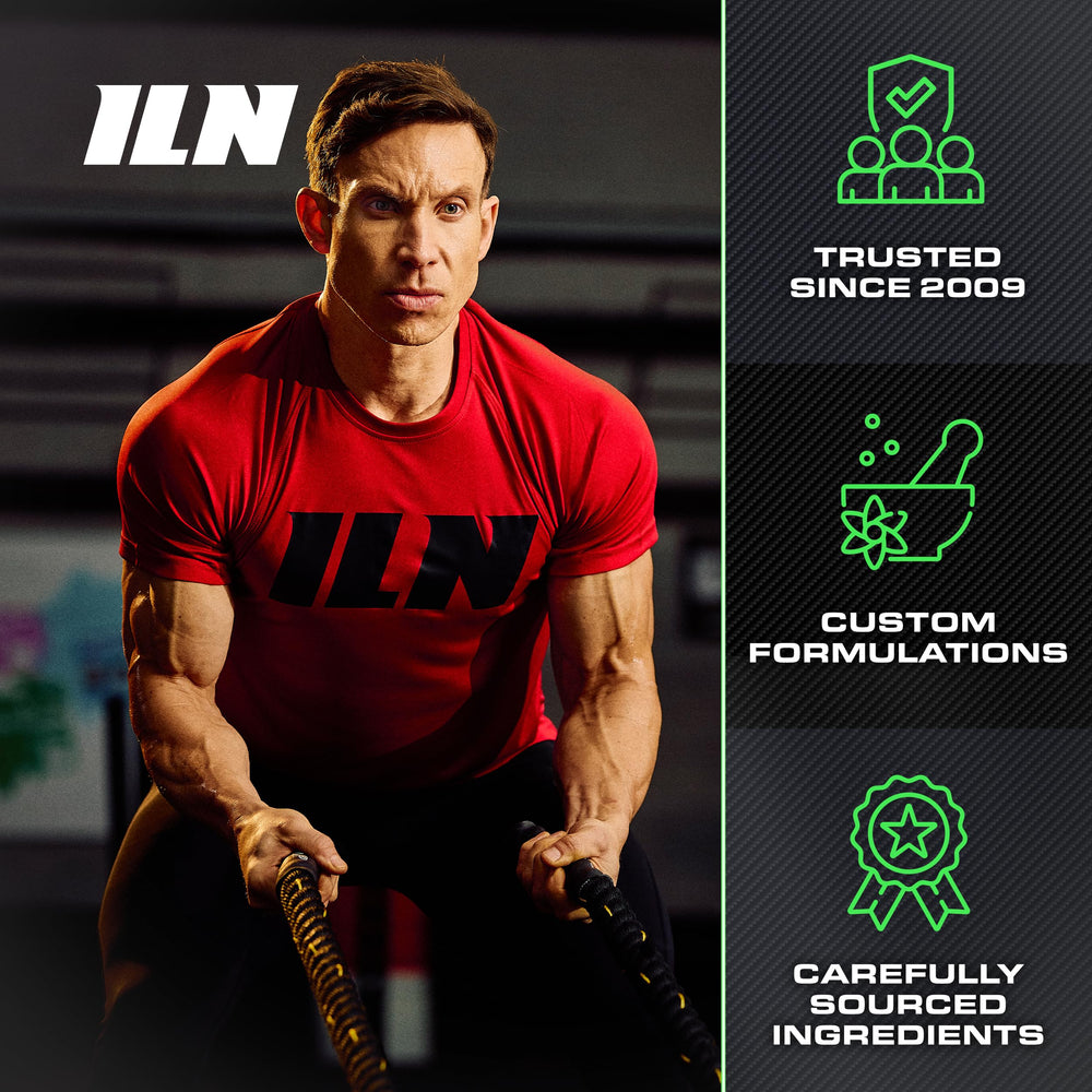Iron Labs Nutrition cápsula al lado de una moneda para mostrar escala real