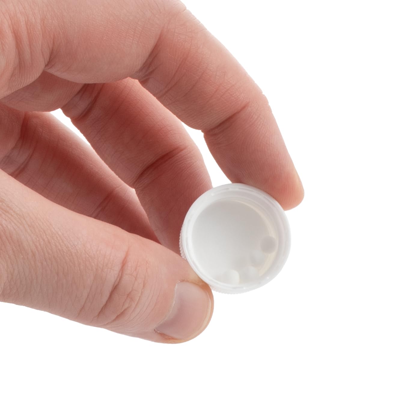 Jackson's Silicea 6X pelotas en mano demostrando tamaño práctico para llevar