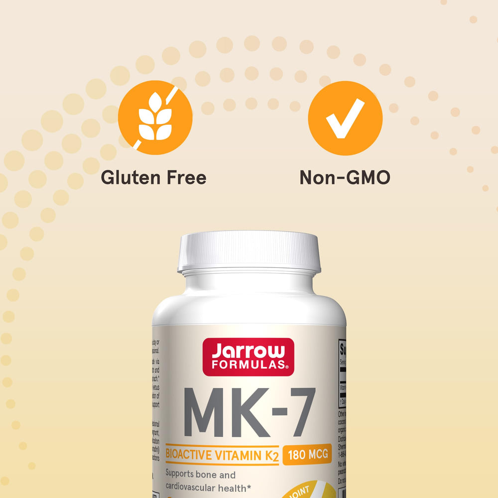 Jarrow Formulas MK-7 cápsula junto a una regla para mostrar tamaño real y dosis fácil